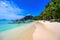 Tropical Papaya beach at paradise coast, El Nido, Palawan, Philippines. Tour A Route. Coral reef and sharp limestone cliffs