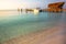 Tropical paradise: Cancun beach with rustic palapa pier, Riviera Maya