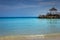 Tropical paradise: caribbean beach with pier and gazebo, Montego Bay, Jamaica