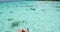 Tropical paradise travel holidays woman enjoying sun after snorkel swim