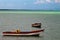 Tropical paradise typical scenery: colored wooden boats docked in the sea. Miches Bay or Sabana De La Mar lagoon, northern