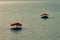 Tropical paradise typical scenery: colored wooden boats docked in the sea. Miches Bay or Sabana De La Mar lagoon, northern