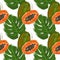 Tropical pattern with juicy papaya and monstera leaves on a white background