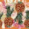 Tropical pattern with pineapples, palm leafs and spots in orange