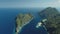 Tropical Philippines Mountain Islands at sea bay aerial view. Green forest on hill ranges at sun day