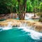 Tropical rain forest with Kuang Si cascade waterfall. Luang Prabang, Laos