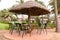 Tropical restaurant with straw sunshade umbrella