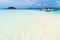 Tropical sandbar with tourists and boats on the Bulog Dos island