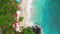 Tropical sandy beach with blue ocean and waves, aerial view. Top view