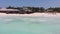 Tropical Sandy Beach with Clear Ocean, Tidal Waves and Hotels, Zanzibar, Aerial