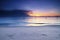 tropical sandy beach over magical twilight sunrise at dawn.