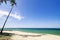 Tropical sandy beach at sunny day.blue sky and torquise sea water.