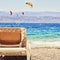 tropical sea beach and chaise lounger. Summer travel and vacation concept