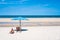 Tropical sea and beach with umbrella and deck chair wiht blue sky.Thai summer