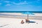 Tropical sea and beach with umbrella and deck chair wiht blue sky.Thai summer