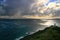 Tropical storm ocean cyclone clouds above the Pacific Ocean, dramatic seascape with Cape Reinga Lighthouse landmark in New Zealand