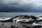 Tropical storm over the beach with surf