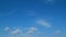 Tropical summer sunlight. Blue sky with cirrus and cumulus on different layers clouds. Fluffy layered clouds sky