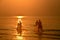Tropical sunrise seascape with ocean net fishermen at Huay Yang beach resort, Thailand