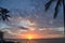 Tropical sunrise seascape with Palm trees, Thailand