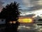 Tropical sunset view with black asphalt after the rain from Peleliu North Port in Palau