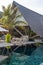 Tropical tranquil amazing beautiful vertical landscape with pool at island luxury resort