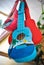 Tropical ukelele photos in blue and red color.