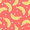 Tropical vector seamless pattern in Living Coral color with banana. Main trend