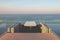 Tropical view of outdoor rooftop of building with seascape view.