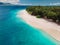 Tropics with white sand beach and turquoise ocean. Aerial view. Gili islands