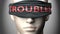 Troubles can make things harder to see or makes us blind to the reality - pictured as word Troubles on a blindfold to symbolize