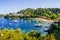 Troulos beach, Skiathos island, Greece. Beautiful vivid panorama view of blue aegean sea coast from wild cliff.  Summer holiday