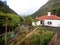 Trout farming pool with traditional house in Ribeiro Frio in Mad