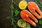 Trout, salmon, salmon fresh pieces of red fish, with vegetables. View from above, with ingredients. Background, book of chains,