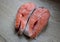 Trout steak lying on a cutting board close-up