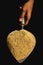 Trowel isolated on Black background. Sand and cement mixed on the trowel, Cement or mortar on the trowel in a hand.Cement Trowel C