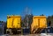 Truck boxes at rest in an industrial yard