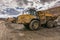 Truck on a building site with mud and water