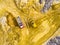 Truck and bulldozer on muddy terrain.