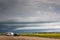 Truck and Camper under Threatening Skies