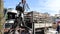 Truck crane carry steel scrap in factory