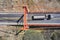 Truck crosses beautiful bridge in summer. Scene. Aerial view of truck carrying things driving across bridge on background