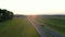 Truck Driver Carrying Cargo On Highway At Sunset Background Aerial View