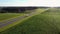 Truck Driver Carrying Cargo On Speed Highway At Sunset Background Aerial View