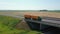 Truck Driver Carrying Cargo On Speed Intercity Highway On Bridge Aerial View