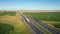 Truck Driver Carrying Cargo On Speed Intercity Highway At Sunset Aerial View