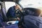 Truck driver falling asleep on steering wheel. Tiredness and sleeping concept