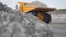 Truck driving career on road. Dump truck carries ore mined in open pit. Heavy large transport in mining industry on