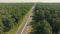 Truck driving highway sun sunset road transport forest field aerial