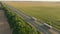 Truck driving highway sun sunset road transport forest field aerial